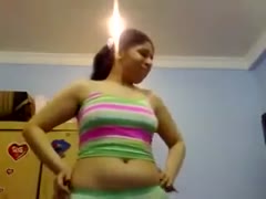 Plump non-professional Pakistani brunette hair dances in her bright raiment on web camera 